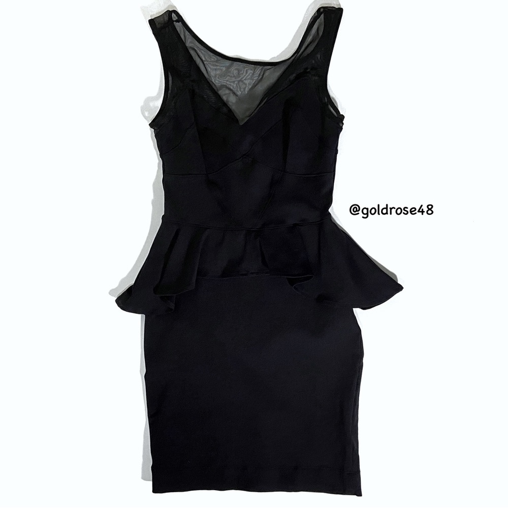 Bebe black Full Spectrum Stella Peplum dress style #70B5S1010000